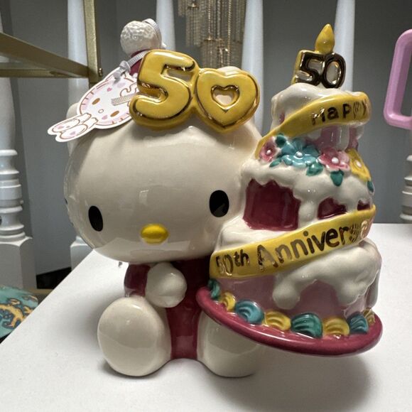 Blue Sky Clayworks - Hello Kitty 50th Anniversary Holding Cake Figurine - 23492 - Picture 1 of 4